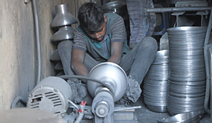 A file photo of aluminum pots made from scrap metal in a market in