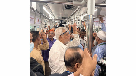 Muhammad Fouzul Kabir Khan, Advisor to the Ministry of Road Transport and Bridges, travelled from Agargaon to Secretariat station today (August 25) after the Metro line was resumed. Photo: Mohammad Ikteder Uddin Mahir