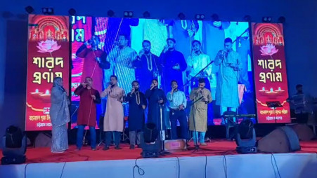 Six members of the Chittagong Cultural Academy performing songs at the Puja Mandap at JM Sen Hall on October 10, 2024. Photo: Screenshot from video