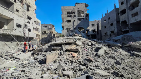 Palestinians gather at the site of Israeli attacks on homes and residential buildings, amid the ongoing conflict between Israel and Hamas, in Beit Lahiya, northern Gaza Strip, October 20, 2024. Photo: REUTERS/Abdul Karim Farid/File Photo