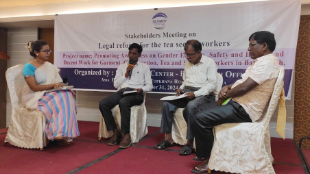 Panelists of the Legal Reform for Tea Sector Workers discuss their points during the meeting in the capital's Topkhana district.