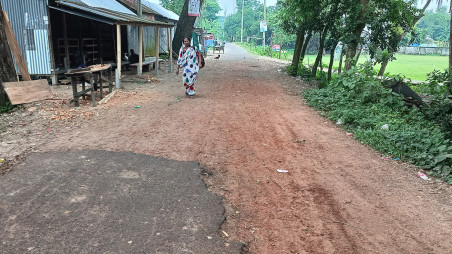 LGED Chitalia-Gayatola Road in Shariatpur Sadar Upazila, connecting eight unions and reaching Shibchar Upazila in Madaripur, is in a dilapidated condition. It is 6 kilometers and 10 feet wide and is riddled with potholes and cracks, causing significant inconvenience to commuters. Heavy vehicles avoid this route and passengers of small vehicles will have to pay double toll due to its poor condition. Photo: TVS