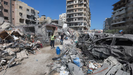 People inspect the damage in the aftermath of an Israeli strike that hit near a hospital on Monday, in Tyre, Lebanon, June 2, 2026. REUTERS/Aziz Taher