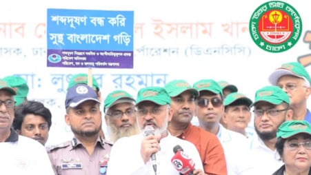 DNCC Administrator Safiqul Islam Khan speaks at a noise-awareness rally in Gulshan-2 on World Environment Day, announcing stricter enforcement against noise pollution in designated silent zones across the capital. Photo: DNCC