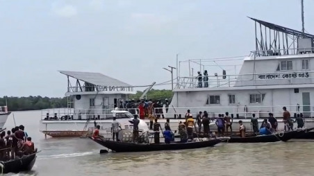 People carrying sticks and brooms arrive by boats and trawlers before vandalising a Coast Guard station and a speedboat in the Joymonir Thota area of Mongla upazila in Bagerhat on 11 June 2026. Photo: Screengrab.