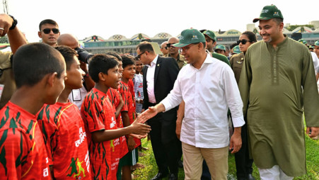 Prime Minister Tarique Rahman met with the players of the Primary School Gold Cup Football Tournament at the Bangladesh Army Stadium today (20 June). Photo: PMO