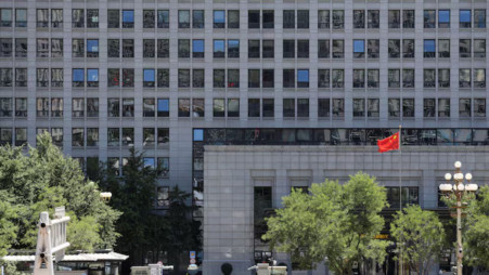 A Chinese flag flutters at the Chinese Ministry of Commerce building in Beijing, China, 4 June, 2025. Photo: REUTERS