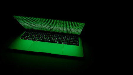 A computer lit by a displayed cyber code is seen in this illustration picture taken on March 1, 2017. Photo: REUTERS/Kacper Pempel/Illustration
