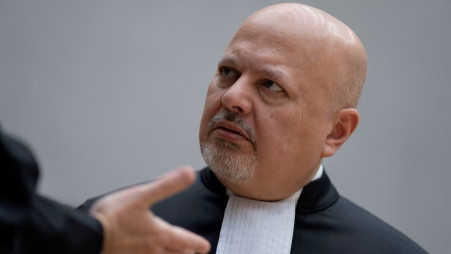 Chief Prosecutor Karim Khan talks while waiting for former Philippine President Rodrigo Duterte to appear via video link before the International Criminal Court (ICC), in The Hague, Netherlands, Friday, 14 March 2025. Peter Dejong/Pool via REUTERS/File Photo 