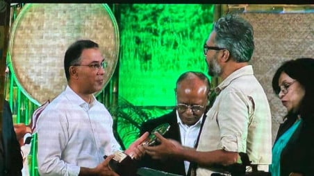 Prime Minister Tarique Rahman presents the National Tree Plantation Award 2025 to Pitachhara conservation project founder Mahfuz Ahmed Russel in Dhaka yesterday (9 July). Photo: Collected