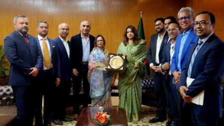 State Minister Shama Obaed Islam receives a commemorative plaque from the Consular Corps in Bangladesh. Photo: UNB