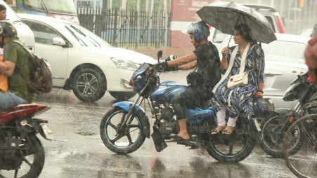 Ride-sharing drivers are feeling the pinch as relentless rain over the past several days has reduced passenger demand and cut their earnings. The photo was taken recently on Bijoy Sarani in Dhaka. Photo: Syed Zakir Hossain