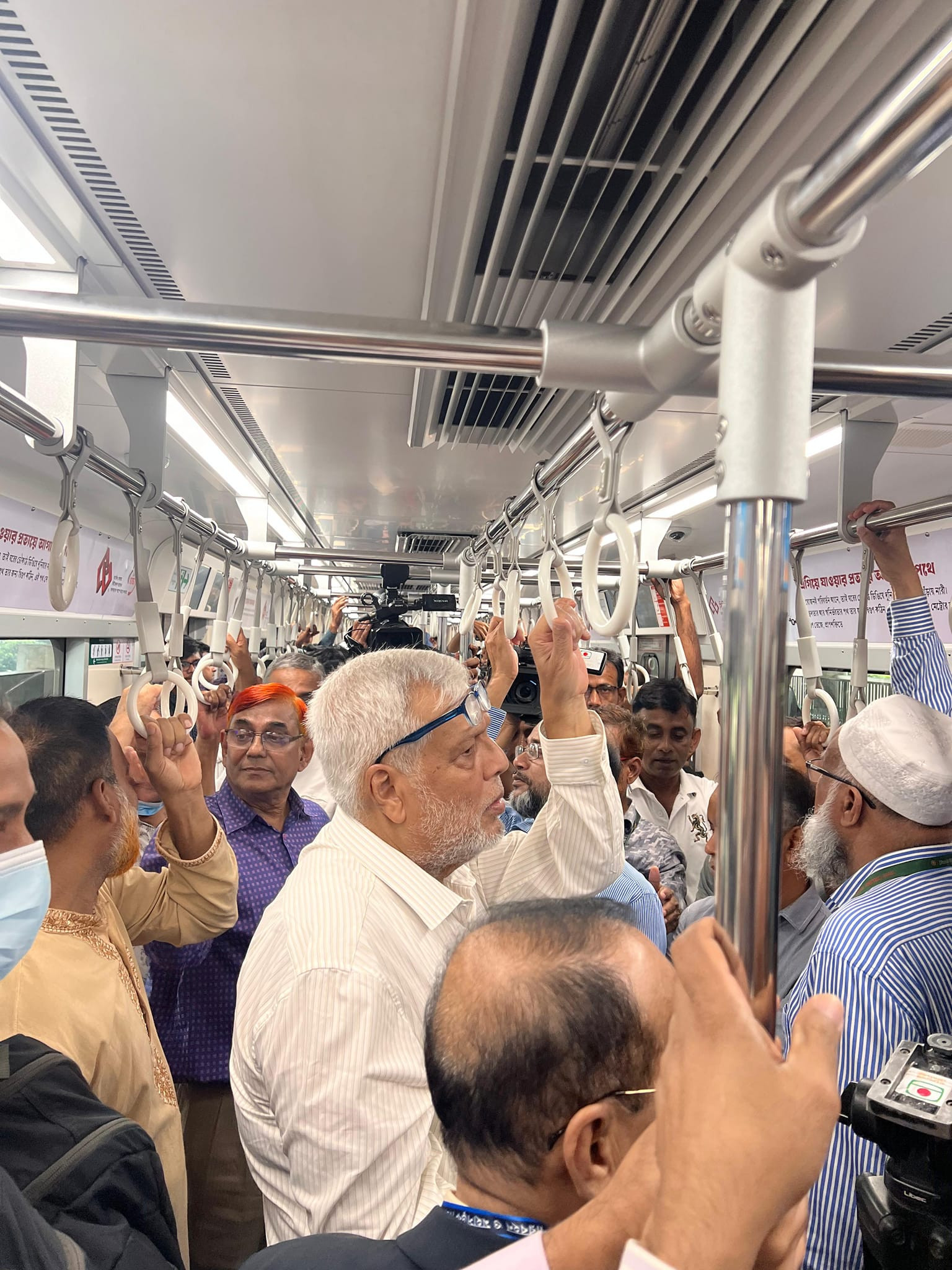 Muhammad Fouzul Kabir Khan, Advisor to the Ministry of Road Transport and Bridges, travelled from Agargaon to Secretariat station today (August 25) after the Metro line was resumed. Photo: Mohammad Ikteder Uddin Mahir