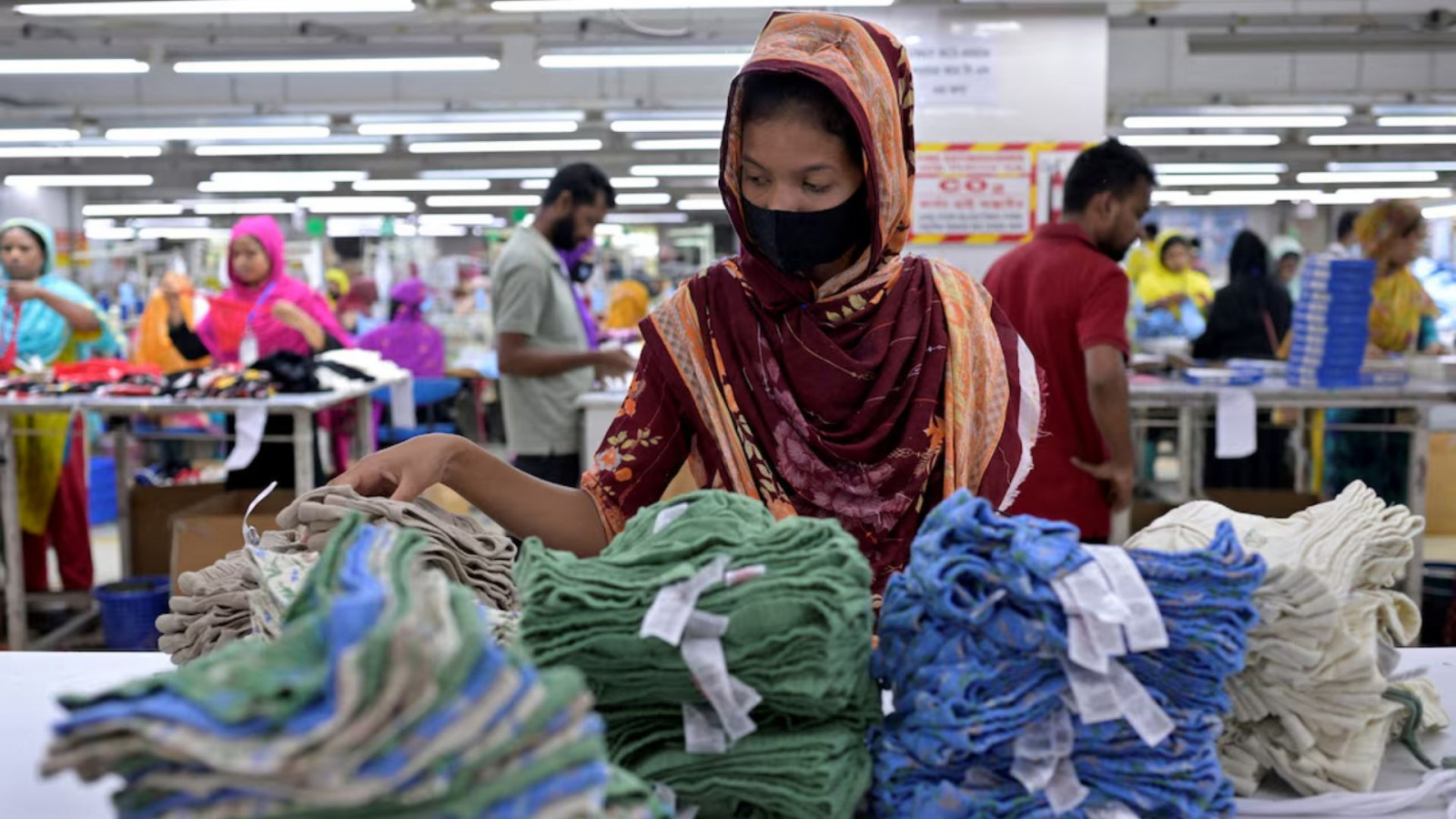 A worker sorts undergarments at the packing section of a garment factory in Ashulia, on the outskirts of Dhaka, Bangladesh on 19 April 2025. Photo: Fatima Tuj Johora/Reuters