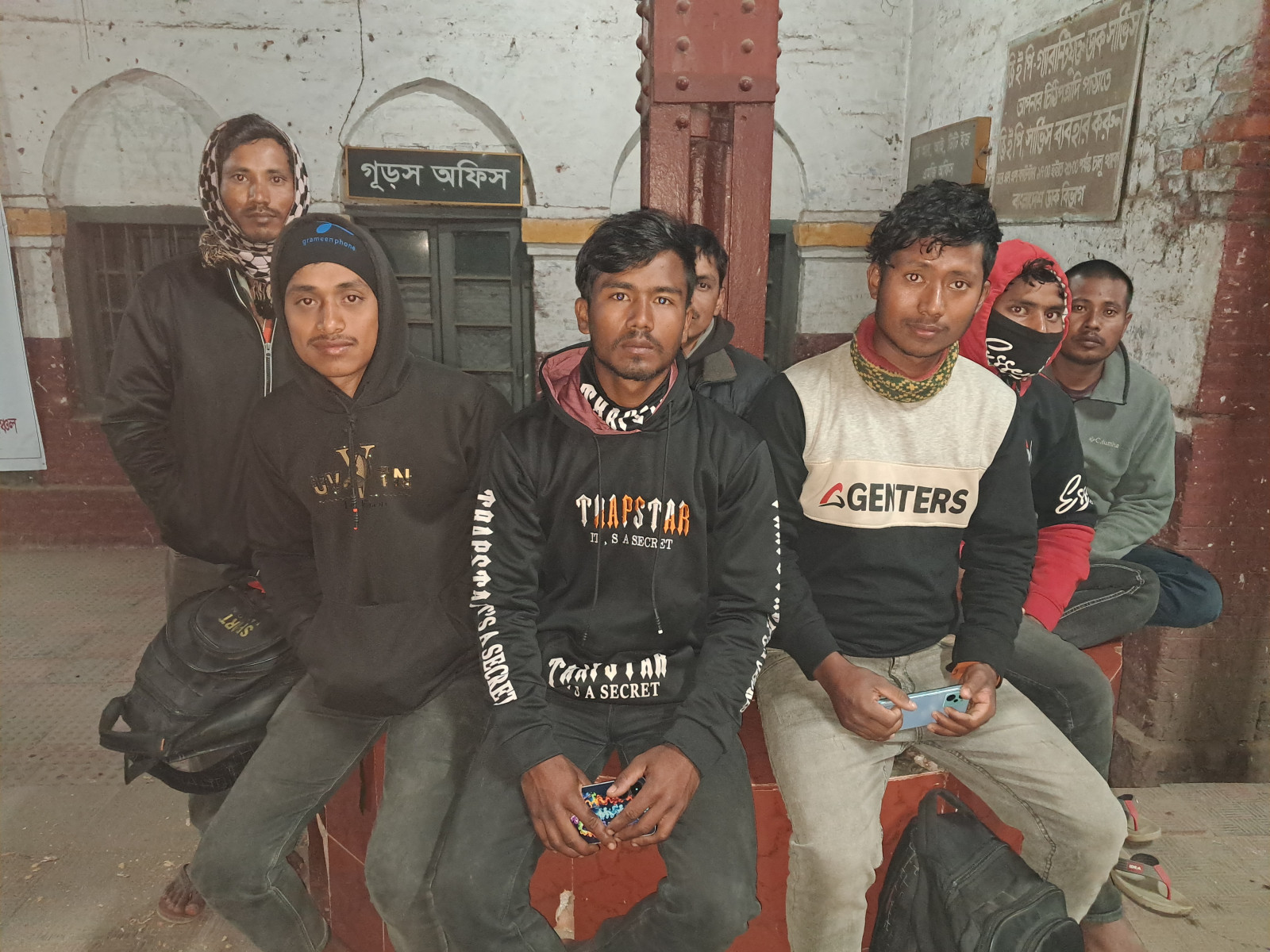 Pradip Chandra Roy (standing in left) and his friends are from Nilphamari, and they work in brick kilns. They leverage their networks to secure work opportunities across northern districts. Photo: Mahmudul Islam 

 