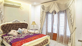 Repeating the wall colour while choosing the curtain can be an attractive thing. Photo: Noor-A-Alam
