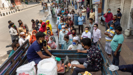 The note changed again as people started beelining to the relief- and low-cost food trucks. Photo: Saikat Bhadra