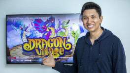 Tanveer Ahmed posed for a photo at his Banani office with the company's flagship mobile game Dragon Village recently. Photo: Noor-A-Alam