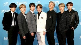 BTS band members at an event/Collected