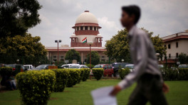 A man walks inside the premises of the Supreme Court in New Delhi, India, on 17 July 2018. File Photo: Reuters 