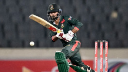 Towhid Hridoy anchors Bangladesh's chase with an unbeaten 40 as the Tigers secure a historic ODI series victory over Australia in Mirpur on 11 June 2026. Photo: AFP/Getty Images