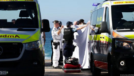Police and emergency personnel at Sydney's Coogee Beach after reports of a shark attack. Photo: Hollie Adams/REUTERS