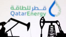 3D-printed oil pump jacks and the QatarEnergy logo appear in this illustration taken March 2, 2026. Photo: Reuters