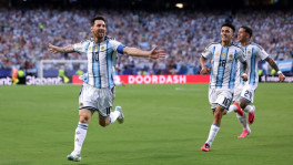 Argentina’s Lionel Messi celebrates after scoring his side’s opening goal against Algeria today (17 June). Photo: Reuters