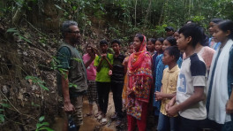 Mahfuz Russell speaks with local children in Pitachhara forest. He believes involving local communities is the most important aspect of conservation initiatives.
Photo: TBS
