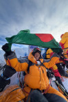 Nurunnahar Nimni celebrates atop Mount Everest with the Bangladesh flag after summiting the world's highest peak. Photo: Courtesy