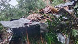 Torrential rains triggered a landslide, causing a large mass of mud to collapse onto a makeshift house in Chattogram's Sitakunda today (8 July). Photo: TBS