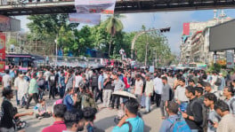HSC examinees block Dhaka’s Science Lab intersection earlier in the day, demanding the resignation of Education Minister ANM Ehsanul Haque Milon and a review of the decision to hold examinations amid flood concerns. Photo: TBS