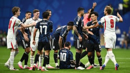 England's Elliot Anderson, Anthony Gordon and Harry Kane clash with Argentina's Nahuel Molina, Giuliano Simeone, Enzo Fernandez, Cristian Romero and Lisandro Martinez as Lionel Messi sits on the ground at the Fifa World Cup Semi Final at Atlanta Stadium, Atlanta, Georgia, US on 15 July 2026. Photo: Reuters