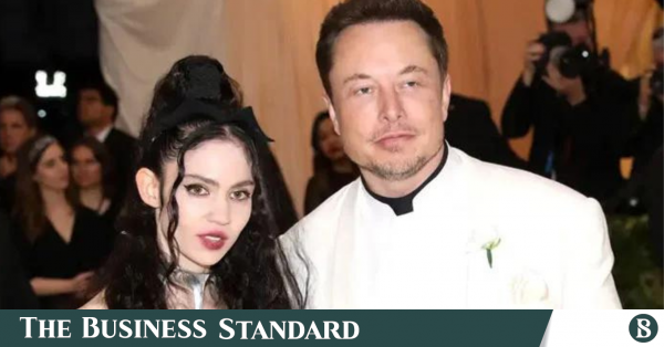 Elon Musk's ex-wife told his biographer that deep inside the Tesla CEO 'is  this manchild still standing in front of his father